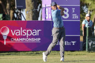 Adam Schenk tees off on the eighth hole during the first round of the Valspar Championship golf tournament Thursday, March 16, 2023, at Innisbrook in Palm Harbor, Fla. (AP Photo/Mike Carlson)