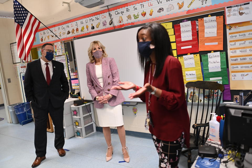 First lady Jill Biden and Education Secretary Miguel Cardona visit a classroom as they tour Benjamin Franklin Elementary School, Wednesday, March 3, 2021 in Meriden, Ct. (Mandel Ngan/Pool via AP)