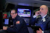 Traders work on the floor of the New York Stock Exchange (NYSE) in New York