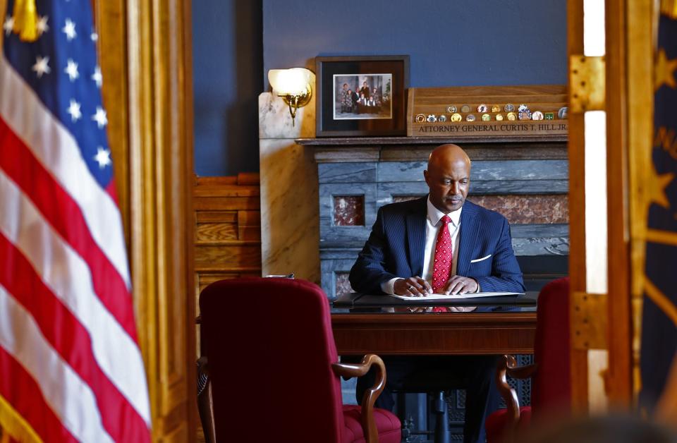 Indiana Attorney General Curtis Hill prepares to address the news media on Monday.