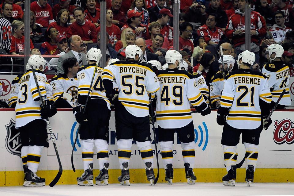 WASHINGTON, DC - APRIL 22: Boston Bruins head coach Claude Julien talks to his team during a time out in the second period against the Washington Capitals in Game Six of the Eastern Conference Quarterfinals during the 2012 NHL Stanley Cup Playoffs at Verizon Center on April 22, 2012 in Washington, DC. (Photo by Patrick McDermott/Getty Images)