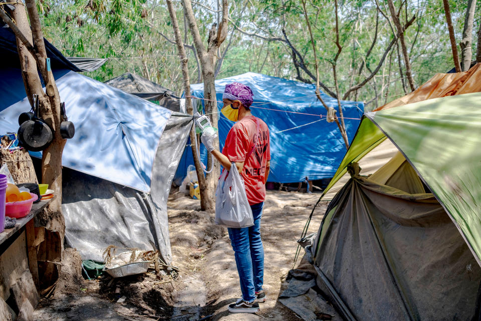 A member of the Global Responses Management medical team in the Matamoros camp on April 24. 