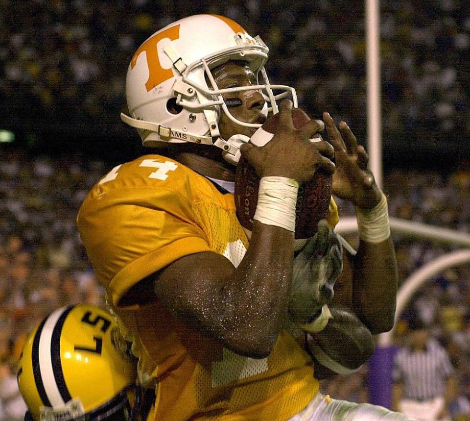 Cedrick Wilson catches a pass to make the score 30-31 in the final minutes against LSU on Sept. 30, 2000. After a furious rally sent the game into overtime, the 11th-ranked Vols fell 38-31 in an upset for the Nick Saban-led Tigers.