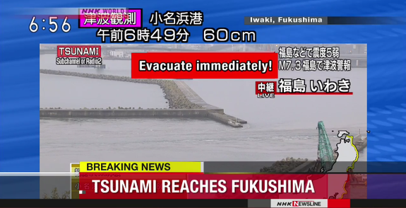 A Japanese news broadcast captures 60-centimeter-high tsunami waves in Fukushima, Japan, Nov. 22, 2016.