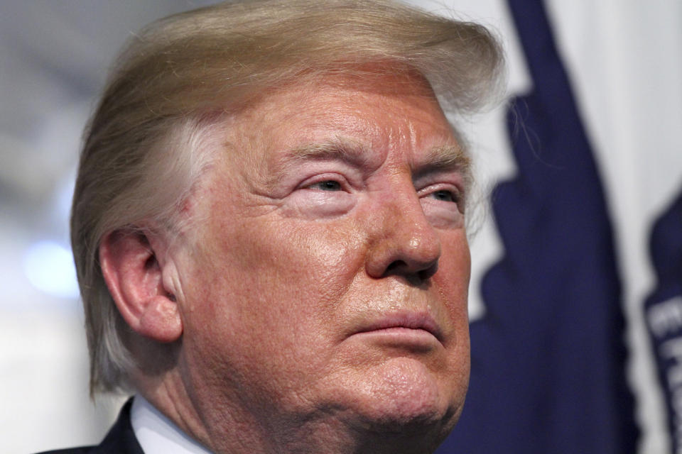 In this June 1, 2018 photo, President Donald Trump attends a Change of Command ceremony at the U.S. Coast Guard Headquarters in Washington. (PHOTO: Associated Press)