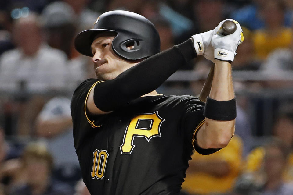 Pittsburgh Pirates' Bryan Reynolds follows through on a three-run home run off Detroit Tigers relief pitcher Nick Ramirez during the sixth inning of a baseball game in Pittsburgh, Wednesday, June 19, 2019. (AP Photo/Gene J. Puskar)