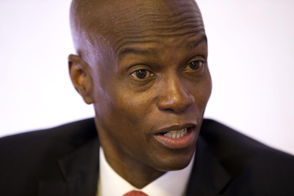 Haiti's President Jovenel Moise speaks during an interview in his office in Port-au-Prince, Haiti, Wednesday, Aug. 28, 2019. Moise told The Associated Press Wednesday that he will serve out his term despite rising violence, poor economic performance and months of protests over unresolved allegations of corruption in his predecessor’s administration. (AP Photo/Dieu Nalio Chery)