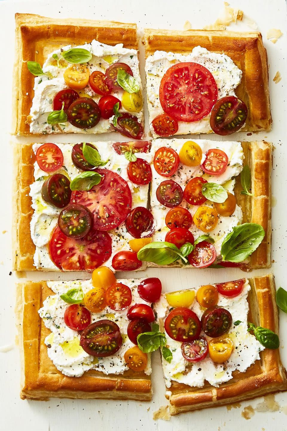 <p>With one bite, you'll get a taste of summer's freshest — and most popular — flavors.</p><p><em><a href="https://www.goodhousekeeping.com/food-recipes/healthy/a22750354/herbed-ricotta-and-fresh-tomato-tart-recipe/" rel="nofollow noopener" target="_blank" data-ylk="slk:Get the recipe for Herbed Ricotta and Fresh Tomato Tart »;elm:context_link;itc:0;sec:content-canvas" class="link ">Get the recipe for Herbed Ricotta and Fresh Tomato Tart »</a></em></p>