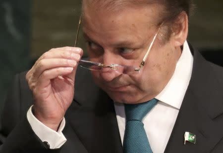 Prime Minister Nawaz Sharif of Pakistan removes his eyeglasses after addressing the United Nations General Assembly in the Manhattan borough of New York, U.S., September 21, 2016. REUTERS/Carlo Allegri