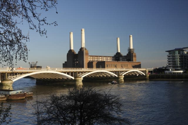 Battersea power station on a warm spring evening, sitting proudly by the River Thames