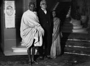 (Original Caption) Original caption: Mr Gandhi Meets The Aga Khan, At The Ritz Hotel, London, 1931. Information from photo: Gandhi; Mohandas Karamchand, known as Mahatma: (1869-1948) Indian leader, born in Porbandar, Kathiawar. He studied law in London, & in 1893 he have up a Bombay legal practice worth £5000 a year to live on £1 a week in South Africa, where he spent 21 years opposing discriminatory legislation against Indians. In 1914 he returnerd to India. While supporting the British in WW1, he took an increasing interest in the Home Rule movement (swaraj), over which he soon obtained a personal dominance, becoming master of the congress organization. His civil disobedience campaign of 1920 involved violent disorders. From 1922 to 1924 he was in jail for conspiracy & in 1930 he led a 200 mile march to the sea to collect salt in symbolic defiance of the government monopoly (Photo by © Hulton-Deutsch Collection/CORBIS/Corbis via Getty Images)