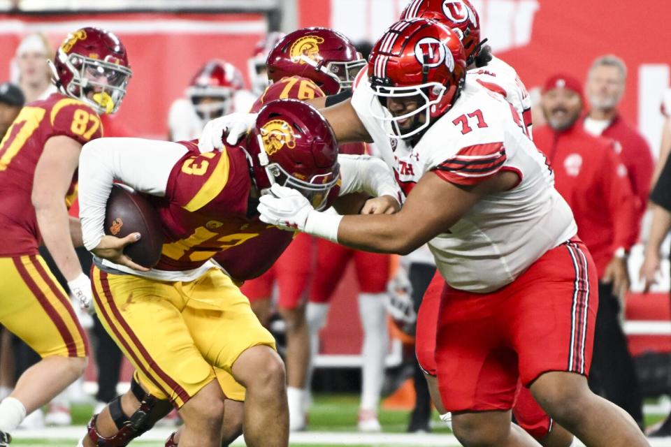 Utah defensive tackle Simote Pepa sacks USC quarterback Caleb Williams during the third quarter.