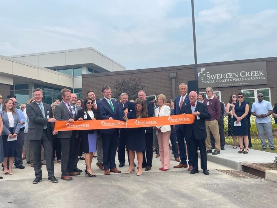 HCA Chief Operating Officer for Behavioral Health Services at Mission Hospital Melina Arrowood cuts the ribbon for the Sweeten Creek Mental Health and Wellness Center July 18.