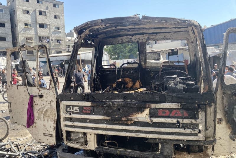 Palestinians inspect the destruction after an Israeli attack on the Al-Zahraa School in the east of Gaza City. Hadi Daoud/APA Images via ZUMA Press Wire/dpa