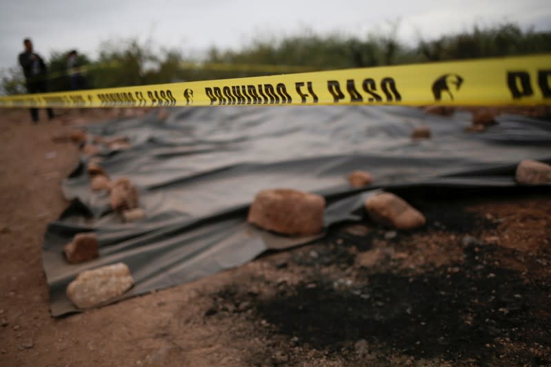 A police cordon is seen at the crime scene where members of the Miller-Lebaron Family were killed near Bavispe