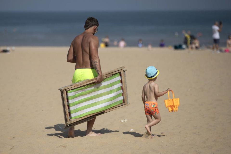 Margate: Families make their way to the beach (Getty Images)