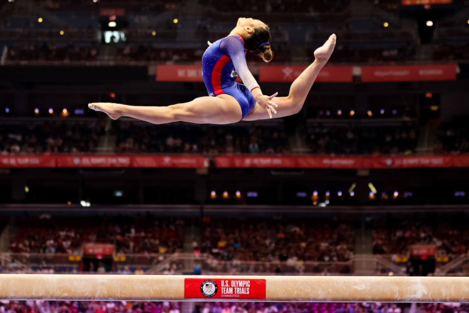 Sunisa Lee competes on beam during day 2 of the women's 2021 U.S. Olympic Trials - Gymnastics at America’s Center on June 25, 2021 in St Louis, Missouri.<span class="copyright">Carmen Mandato/Getty Images—2021 Getty Images</span>