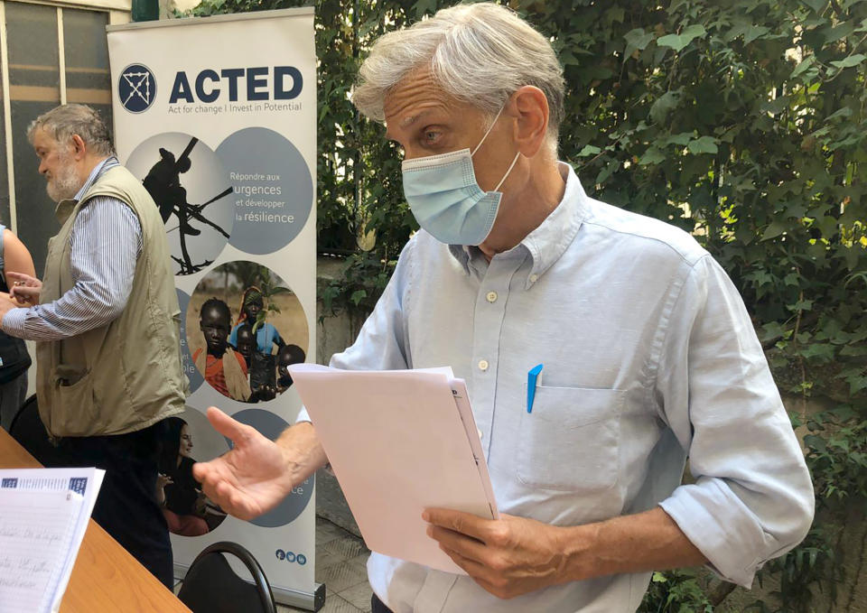 Frederic de Saint-Sernin, vice-CEO of non governmental organization ACTED, answers reporters in Paris, Monday Aug.10, 2020 in Paris. French anti-terrorism prosecutors formally opened an investigation one day after eight people, including six French nationals, were killed by gunmen in a Niger giraffe park. (AP Photo/Nicolas Garriga)