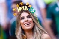 <p>A Brazil fan waits for the start of the Russia 2018 World Cup round of 16 football match between Brazil and Mexico at the Samara Arena in Samara on July 2, 2018. (Photo by BENJAMIN CREMEL / AFP) </p>