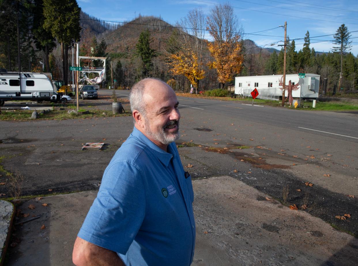 Chris LaVoie visits the main street of Blue River more than three years after the Holiday Farm Fire destroyed much of rural town.