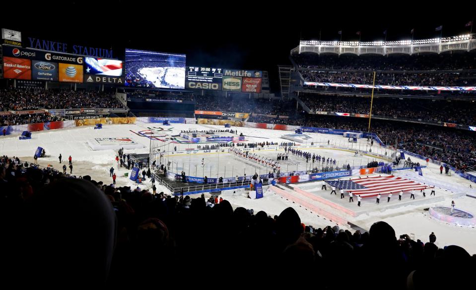Jan 29, 2014; New York City, NY, USA; A general view during the playing of the national anthem before the Stadium Series hockey game between the New York Islanders and the New York Rangers at Yankee Stadium. Mandatory Credit: Anthony Gruppuso-USA TODAY Sports ORG XMIT: USATSI-138254 ORIG FILE ID: 20140129_jla_ag9_167.jpg