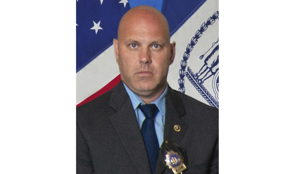 In this undated photo provided by the New York City Police Department, Det. Brian Simonsen is shown. New York Police Commissioner James O'Neill told the media during a news conference that Simonsen was shot and killed by friendly fire Tuesday night, Feb. 12, 2019, while responding to a report of an armed robbery at a T-Mobile store in the Richmond Hill section of Queens. (New York City Police Department via AP)