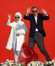 <p>Turkish President Recep Tayyip Erdogan, right, and his wife Emine wave to the crowd during a Democracy and Martyrs’ Rally in Istanbul, Sunday, Aug. 7, 2016. A massive crowd of flag-waving supporters gathered in Istanbul Sunday for a giant rally to mark the end of nightly demonstrations since Turkey’s July 15 abortive coup that left more than 270 people dead. (AP Photo/Emrah Gurel) </p>