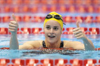 Kaylee McKeown of Australia celebrates after winning the women's 200m backstroke final at the World Swimming Championships in Fukuoka, Japan, Saturday, July 29, 2023. (AP Photo/Eugene Hoshiko)