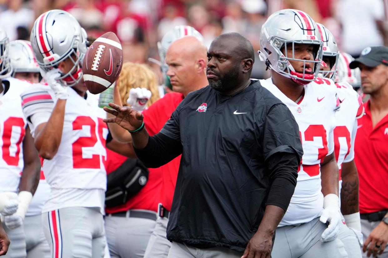 Sep 2, 2023; Bloomington, Indiana, USA; Ohio State Buckeyes running backs coach Tony Alford watches warm ups prior to the NCAA football game at Indiana University Memorial Stadium. Ohio State won 23-3.