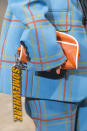 <p><i>Orange leather pouch from the SS18 Marc Jacobs collection. (Photo: ImaxTree) </i></p>