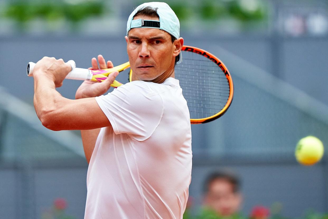 Rafael Nadal of Spain returns a ball during a training session during Day One of Mutua Madrid Open at La Caja Magica on April 28, 2022 in Madrid, Spain.