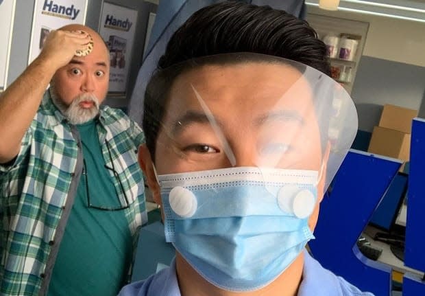 Actor Simu Liu takes a selfie with co-star Lee standing behind him. Lee said the cast had no idea while filming that this season would be their last.