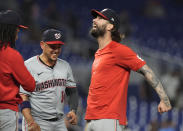Washington Nationals' Jesse Winker celebrates with his teammates at the end of a baseball game against the Miami Marlins, Saturday, April 27, 2024, in Miami. Winker hit a gland slam in the fifth inning. The Nationals defeated the Marlins 11-4. (AP Photo/Marta Lavandier)
