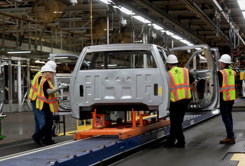 FILE PHOTO: Lordstown Motors associates work on a pre-production all electric pickup truck, the Endurance, in Lordstown