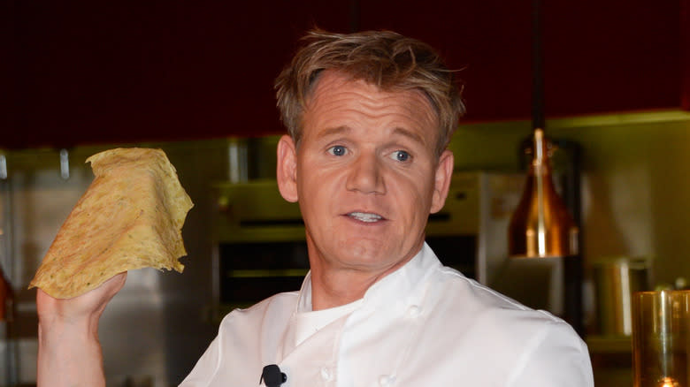 Gordon Ramsay holding flat crêpe