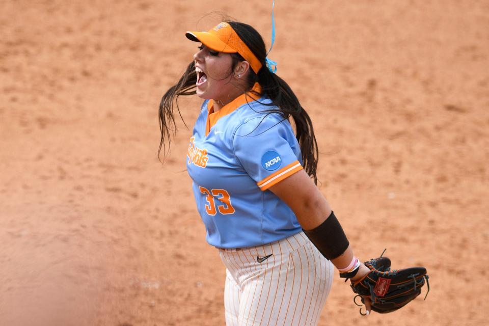 Tennessee pitcher Payton Gottshall (33) yells out after striking out Texas' last batter to win the NCAA super regional in Knoxville,Tenn. on Saturday, May 27, 2023. 