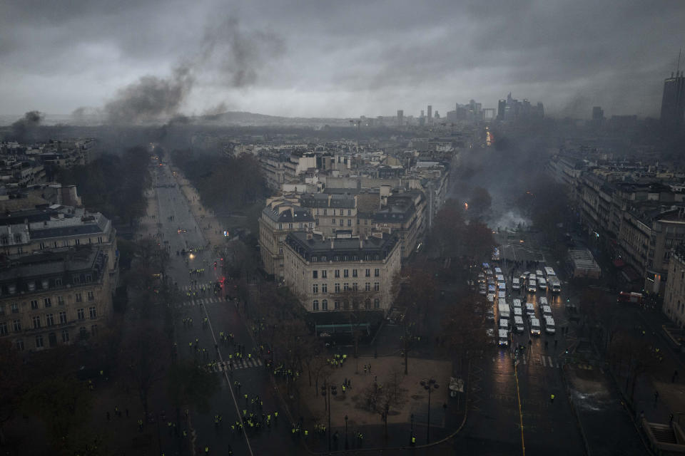 Avenues leading to the Arc de Triomphe are pictured from the top of the monument on the Champs-Elysees during a demonstration, Dec.1, 2018, in Paris. (Photo: Kamil Zihnioglu/AP)
