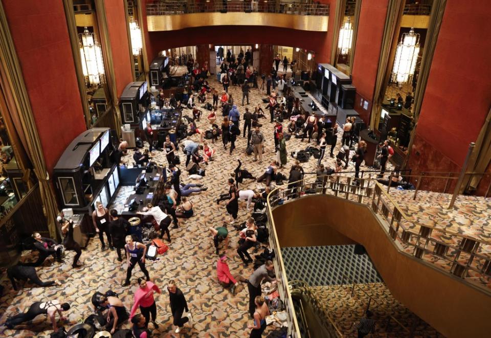 Hundreds of wannabe Rockettes warm up in the Grand Foyer of Radio City. John Angelillo/UPI/Shutterstock