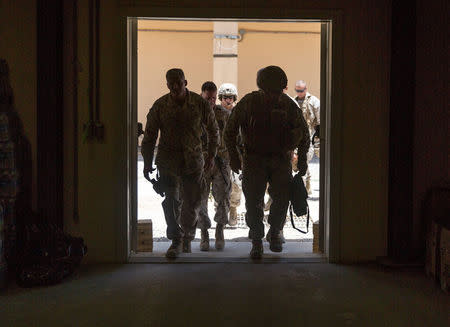 Commandant of the Marine Corps Gen. Robert B. Neller (R) arrives at Bost Airfield, Afghanistan, June 20, 2017. Picture taken June 20, 2017. Courtesy Justin T. Updegraff/U.S. Marine Corps/Handout via REUTERS