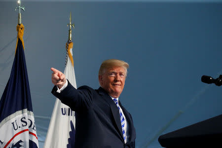 FILE PHOTO: U.S. President Donald Trump participates in the U.S. Coast Guard Change-of-Command ceremony at U.S. Coast Guard Headquarters in Washington, U.S., June 1, 2018. REUTERS/Leah Millis