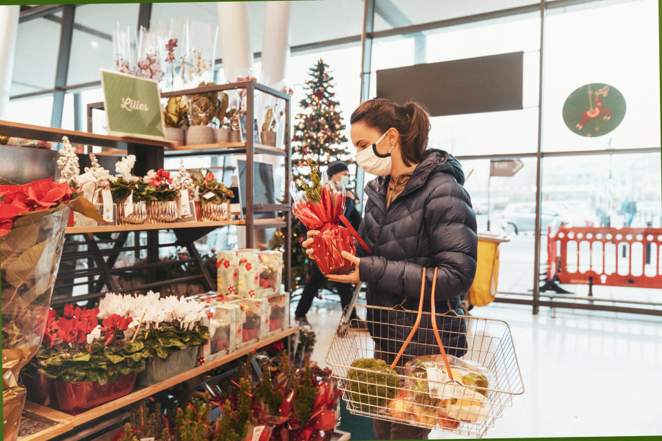 Woman shopping for Christmas gifts