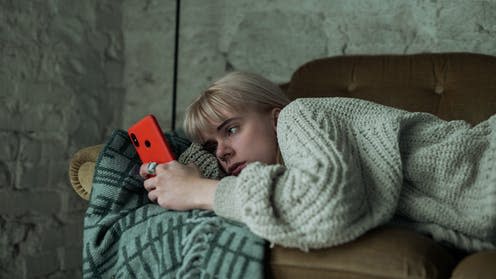 <span class="caption">Even short exposure to bad news can increase worry and anxiety.</span> <span class="attribution"><a class="link " href="https://www.shutterstock.com/image-photo/depressed-young-blonde-woman-scrolling-through-2056979399" rel="nofollow noopener" target="_blank" data-ylk="slk:Stock Unit/ Shutterstock;elm:context_link;itc:0;sec:content-canvas">Stock Unit/ Shutterstock</a></span>