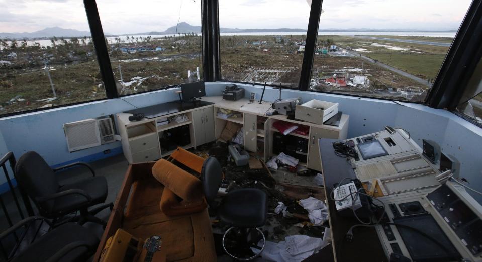 The damaged control tower of Tacloban airport is seen after super Typhoon Haiyan battered Tacloban city, in central Philippines November 9, 2013. Possibly the strongest typhoon ever to hit land devastated the central Philippine city of Tacloban, killing at least 100 people, turning houses into rubble and leveling the airport in a surge of flood water and high wind, officials said on Saturday. The toll of death and damage from Typhoon Haiyan on Friday is expected to rise sharply as rescue workers and soldiers reach areas cut off by the massive, fast-moving storm which weakened to a category 4 on Saturday. REUTERS/Erik De Castro (PHILIPPINES - Tags: DISASTER ENVIRONMENT)