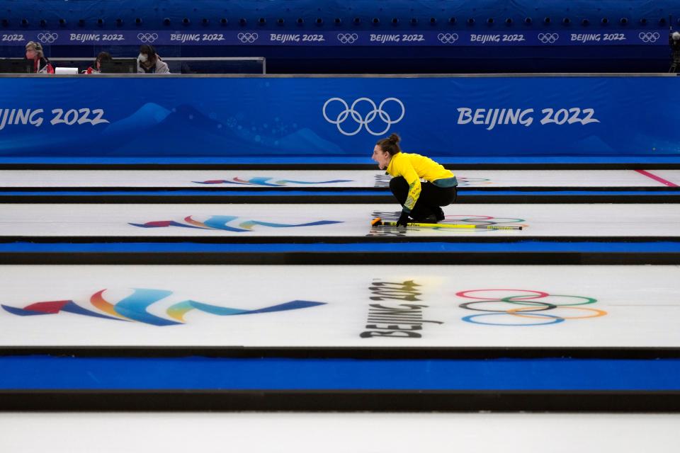 Australia’s Tahli Gill reacts after playing a shot during the mixed doubles curling (AP)