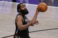 Brooklyn Nets guard James Harden (13) looks to pass the ball during the second half of the team's NBA basketball game against the Dallas Mavericks, Saturday, Feb. 27, 2021, in New York. (AP Photo/John Minchillo)