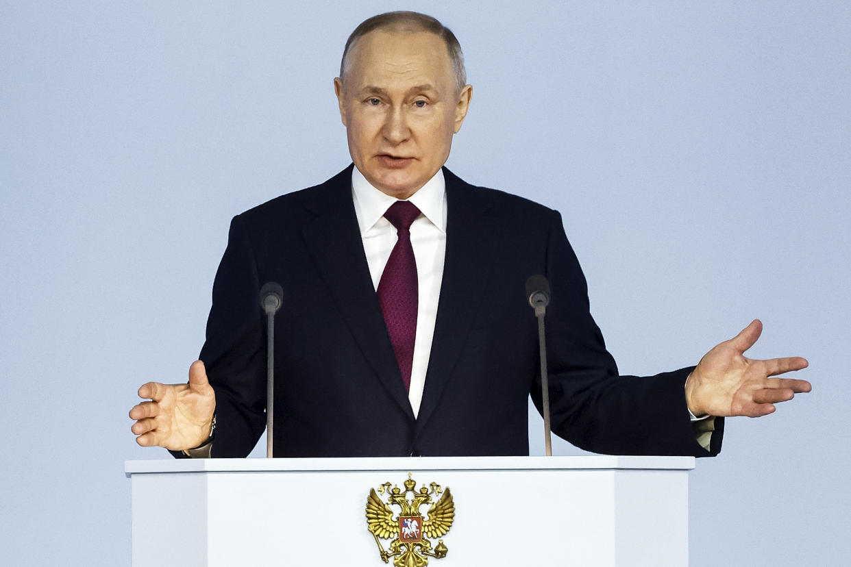 Russian President Vladimir Putin gestures as he gives his annual state of the nation address in Moscow on Tuesday. 
