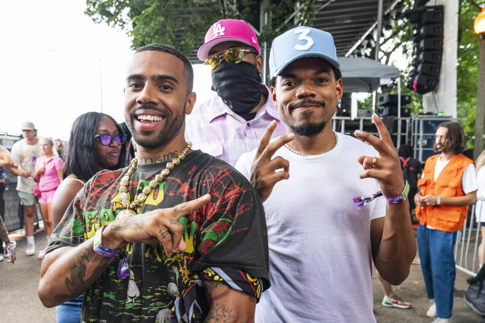 Vic Mensa and Chance the Rapper smiling at Lollapalooza