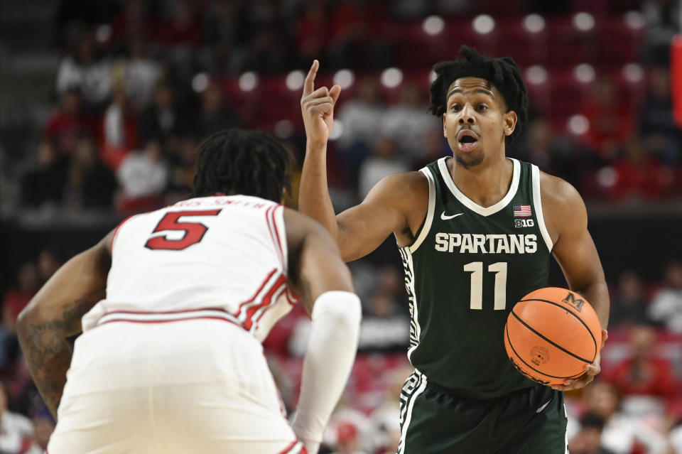 Jan 21, 2024; College Park, Maryland, USA; Michigan State Spartans guard A.J. Hoggard (11) calls the offense during the first half against the Michigan State Spartans at Xfinity Center. Mandatory Credit: Tommy Gilligan-USA TODAY Sports
