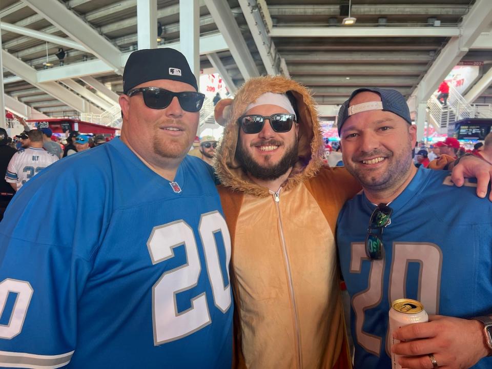 From left, Richard Merriman, Chris Ehmann and Chad Day stood out Sunday in the sea of red at Levi's Stadium. They said they're confident that despite being outnumbered, Lions fans will make an impact.