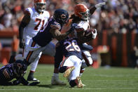 Cleveland Browns running back Kareem Hunt (27) rushes for a first down during the first half of an NFL football game against the Chicago Bears, Sunday, Sept. 26, 2021, in Cleveland. (AP Photo/David Dermer)